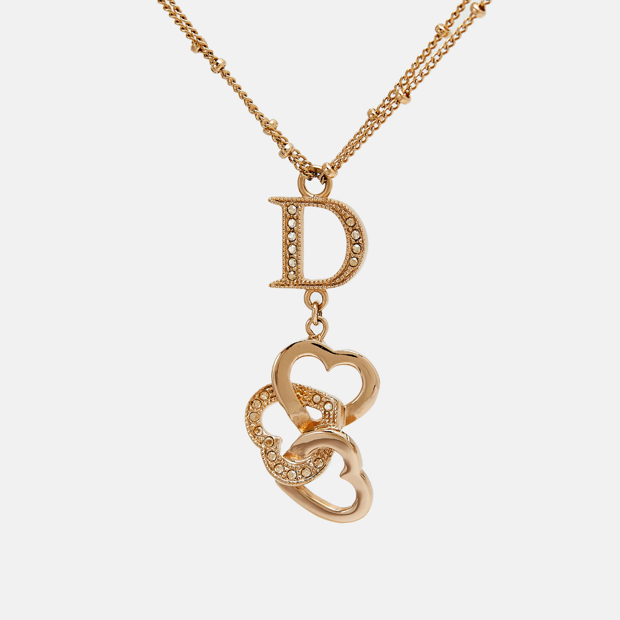 

Dior Crystal Heart Gold Tone Pendant Necklace