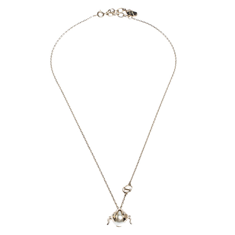 

Dior Crystal Faux Pearl Lady Bug Gold Tone Pendant Necklace