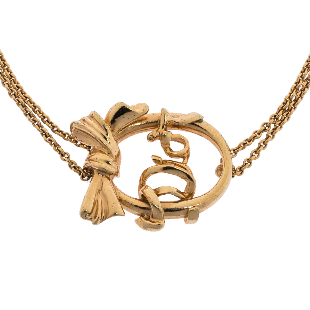 

Dior Bow Monogram Gold Tone Double Chain Bracelet