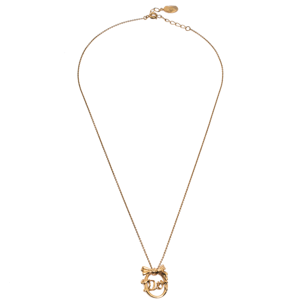 

Dior Gold Tone Oval Bow Pendant Necklace