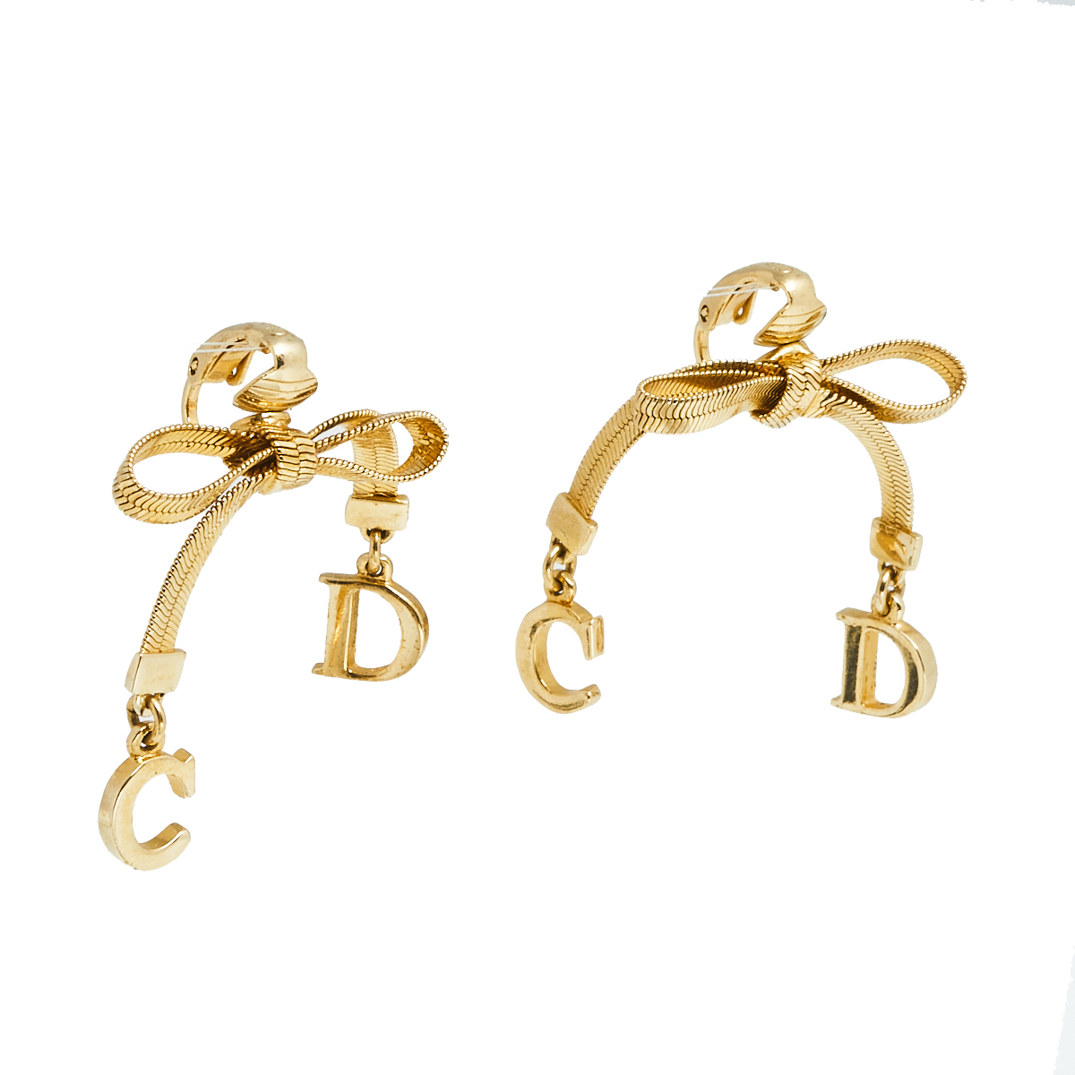 

Dior Vintage Gold Tone Bow Earrings