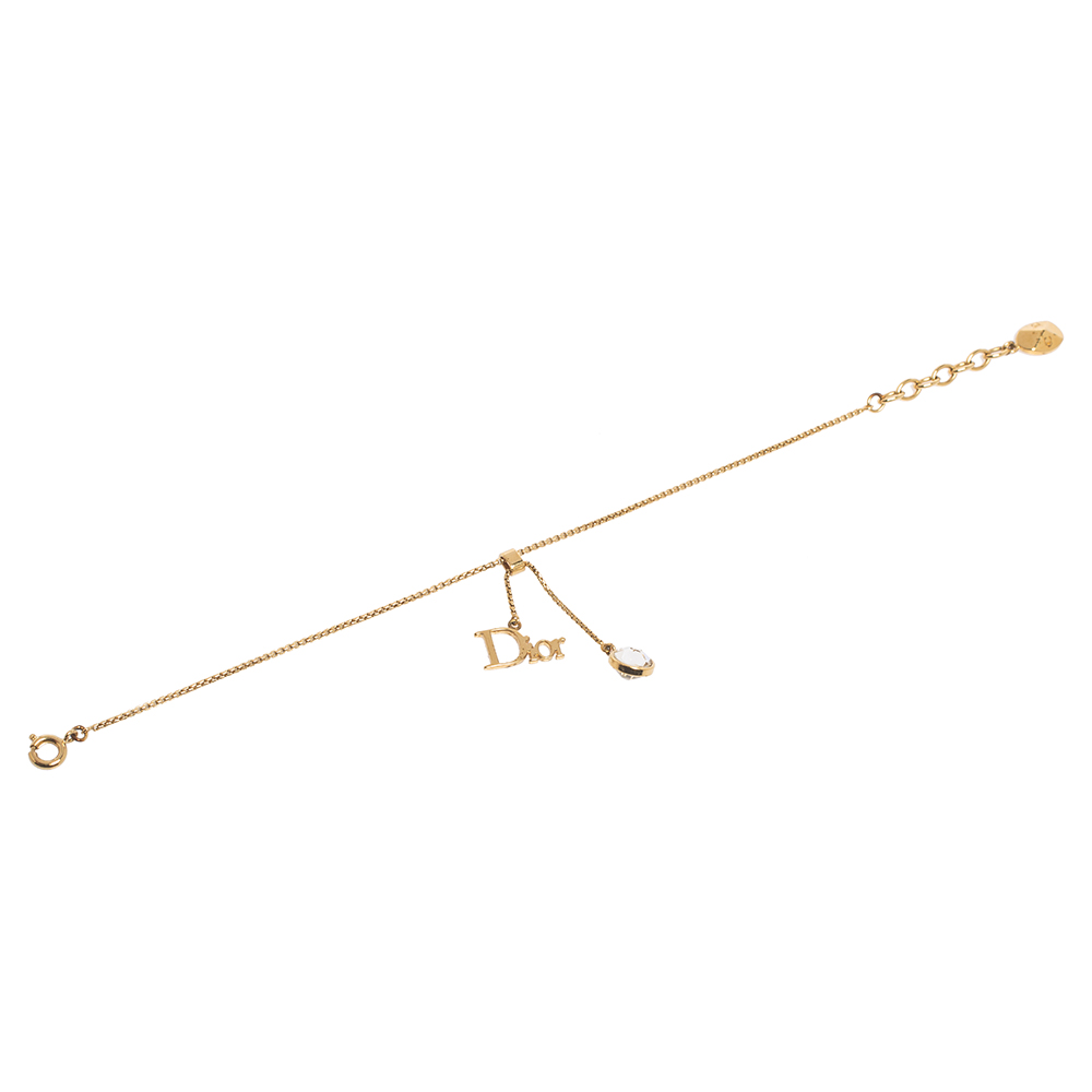 

Dior Gold Tone logo & Crystal Dangling Charm Bracelet