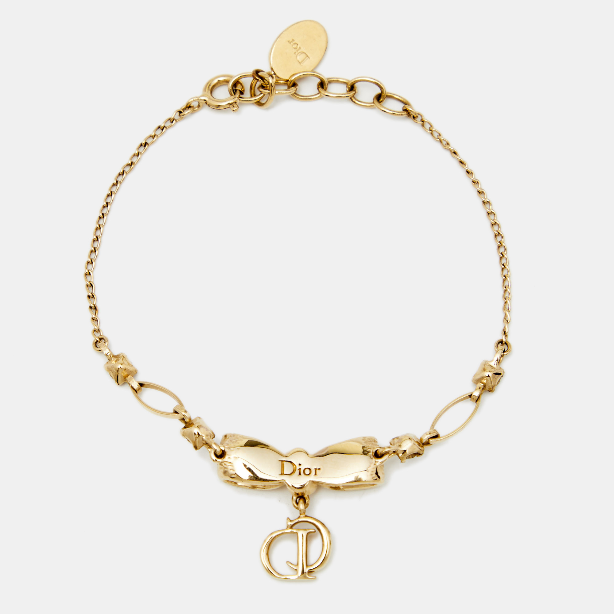 

Dior Vintage Gold Tone Crystal Bow Charm Bracelet