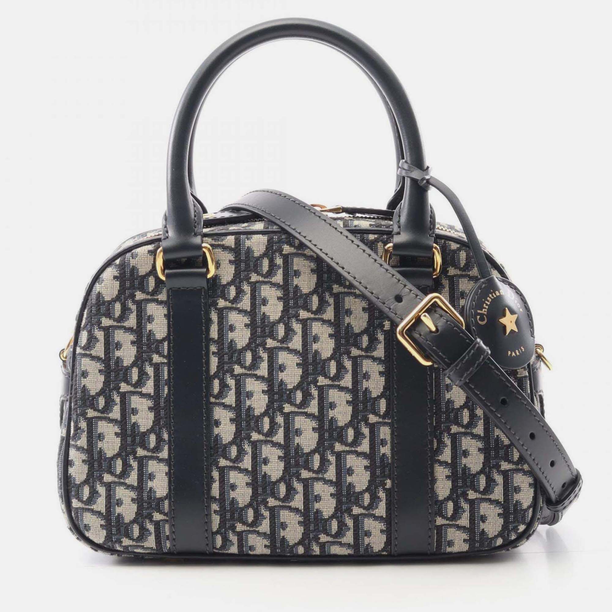 

Christian Dior Dior D-Vibe Medium Oblique Bowling Bag Canvas And Leather Ivory Black Blue