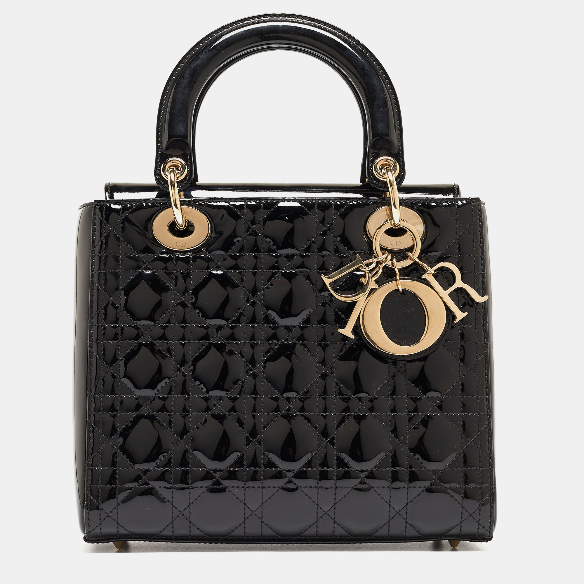 Ensure your days essentials are in order and your outfit is complete with this Lady Dior bag. Crafted using the best materials the bag carries the maisons signature of artful craftsmanship and enduring appeal.