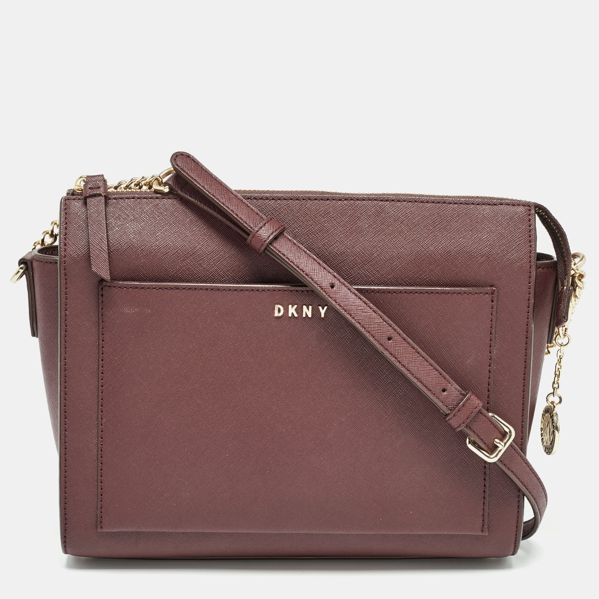 Structured sophisticated and stylish are some words that describe this crossbody bag Crafted from best quality material the creation is adorned with the labels signature appeal held by comfortable handles and equipped with a well spaced interior. Carry it to work or shopping sprees youll look chic