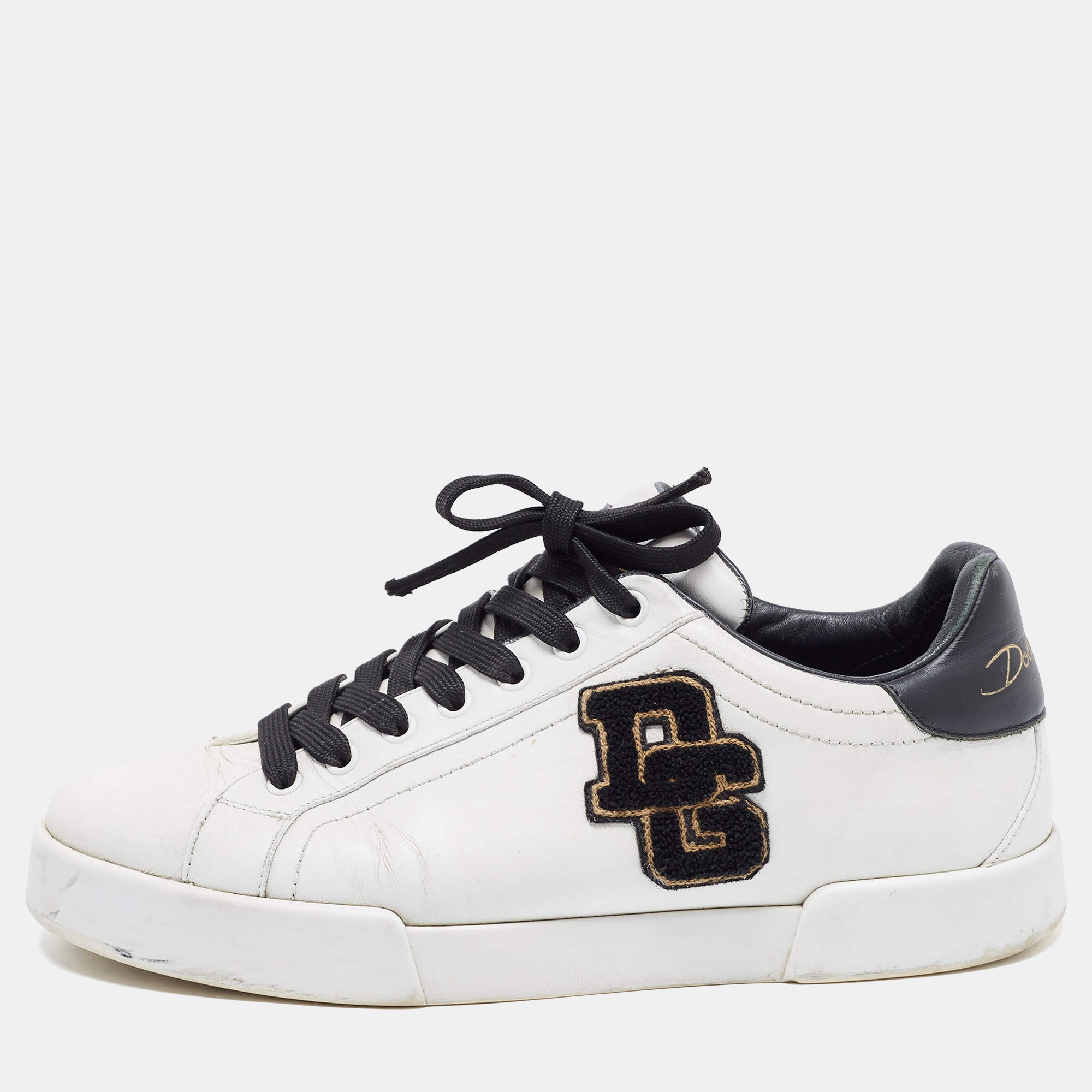 These Portofino sneakers from Dolce and Gabbana will add a sporty element to your casual attire. They are created using white leather on the exterior and show lace up details on the vamps. They have leather lined insoles and rubber soles. Experience comfort as you wear these trendy sneakers.
