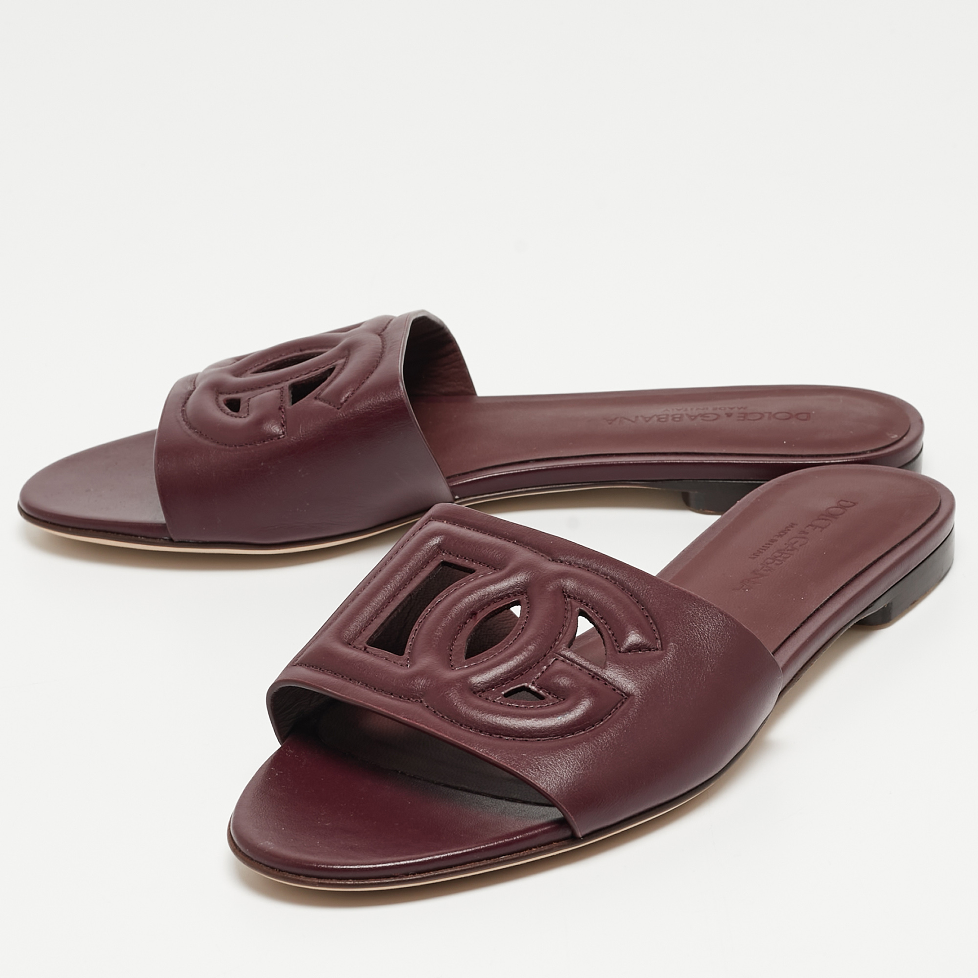 

Dolce & Gabbana Burgundy Leather DG Cut Out Flat Slides Size