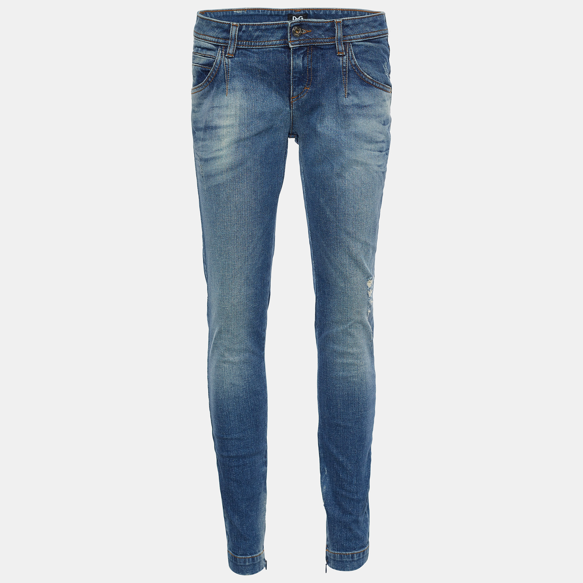 Comfy and classy jeans like these are a closet necessity These jeans from D and G are super stylish and chic. They have been fashioned in indigo distressed denim fabric into a skinny fit silhouette. These jeans are provided with a zipper closure.