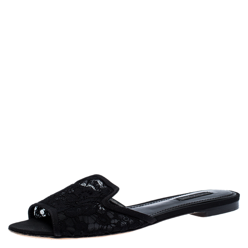 Click to view more detailed imagery on our partner's website Dolce & Gabbana Black Floral Lace Open Toe Flat Slides Size 38