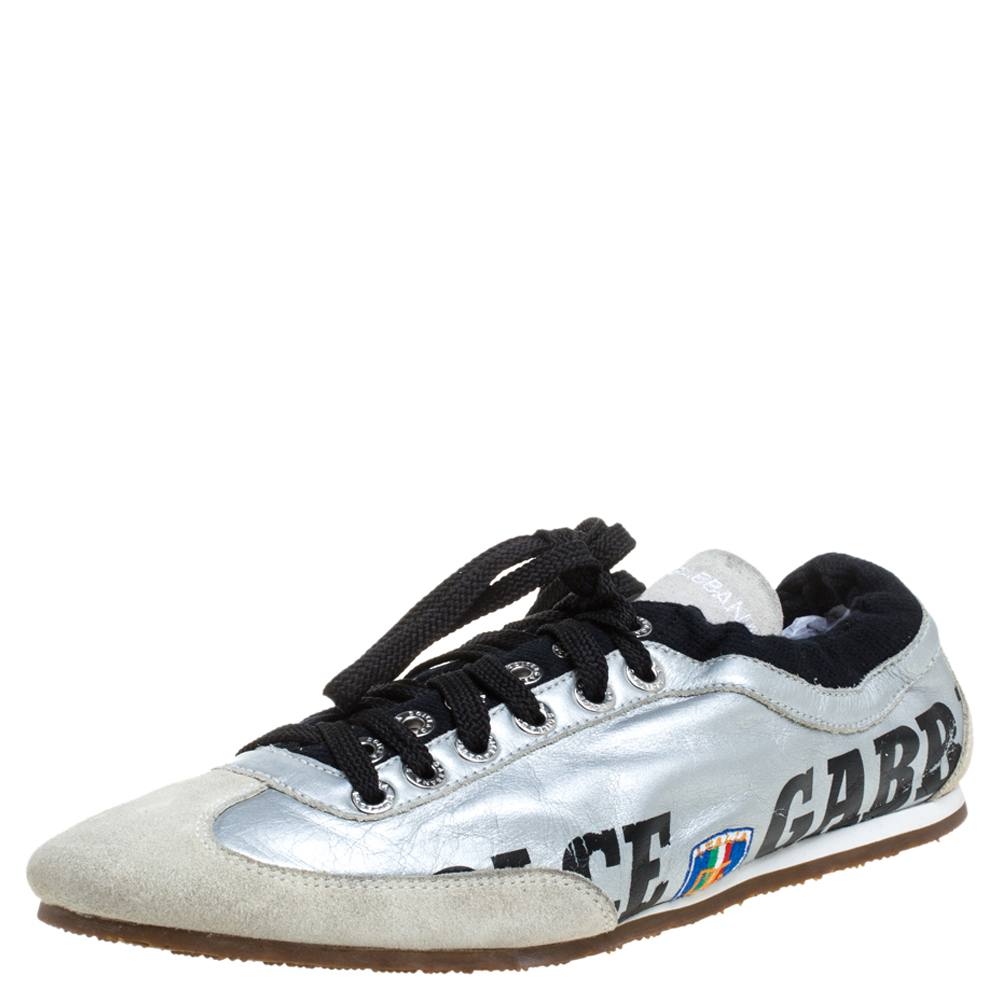 A pair of leather and suede sneakers to lend one all the comfort in this world. These rubber sole sneakers will give you ease in every step. Designed by Dolce and Gabbana they come in tones of beige and silver along with signature branding and lace up vamps. They will easily amp up your style.