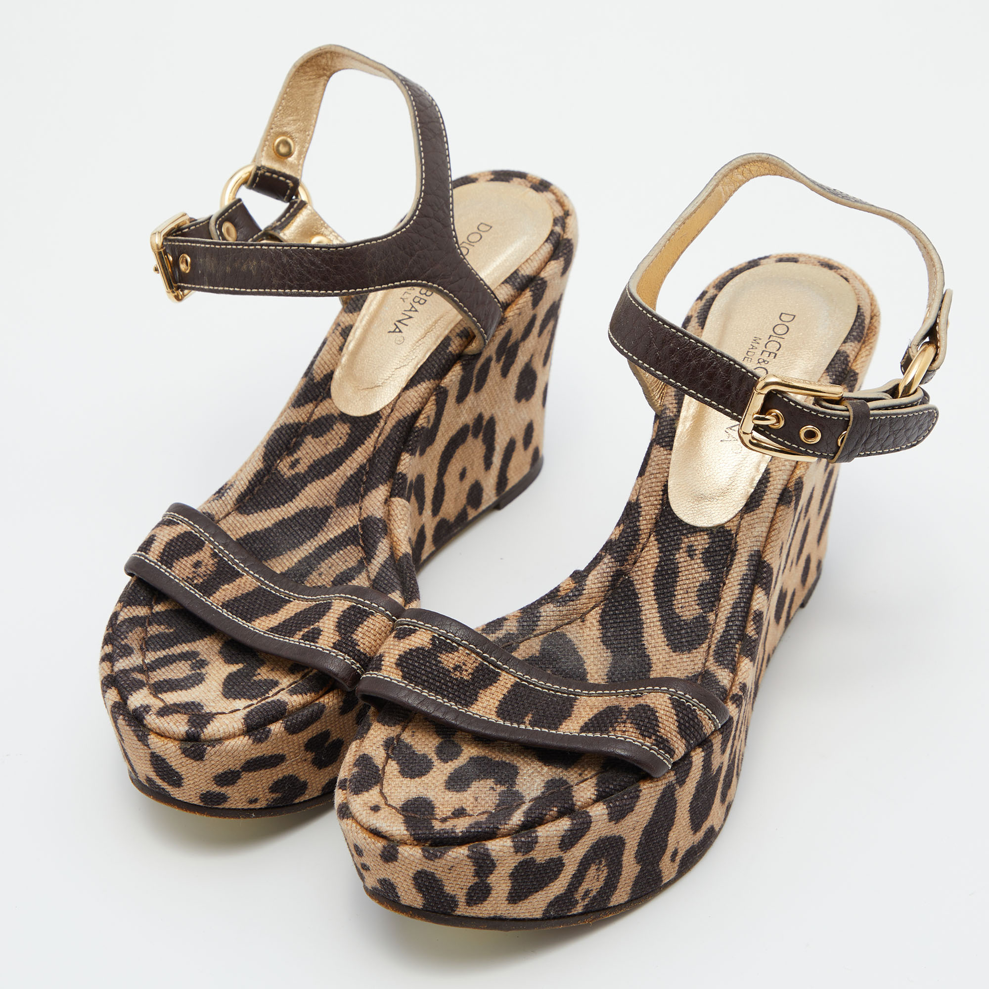

Dolce & Gabbana Brown/Beige Leopard Print Canvas and Leather Ankle Strap Wedge Sandals Size