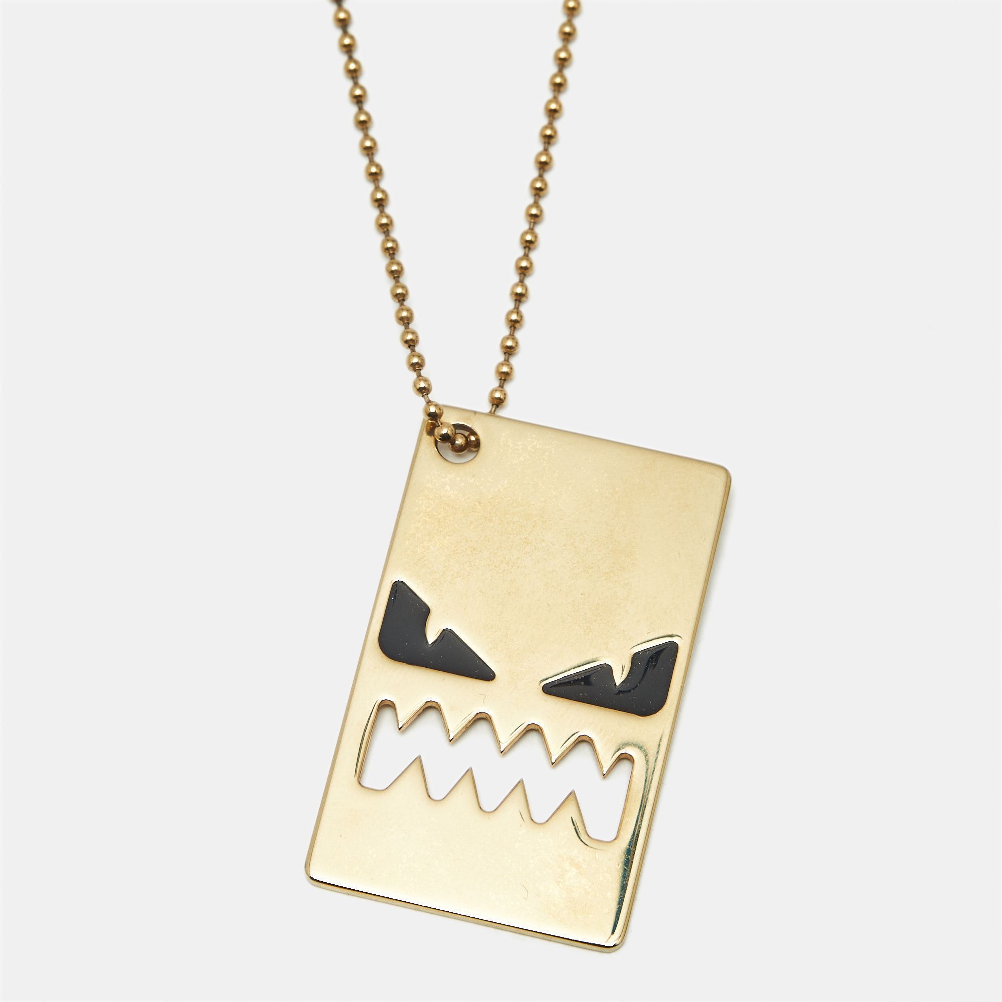 

Fendi Monster Enamel Gold Tone Tag Necklace