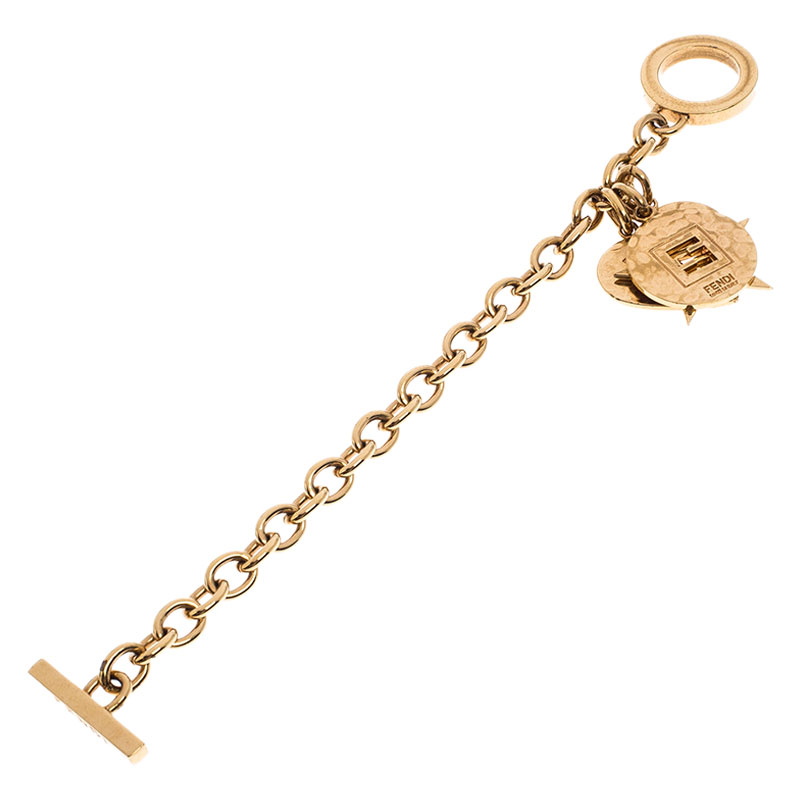 

Fendi Multi Charm Gold Tone Chain Link Toggle Bracelet