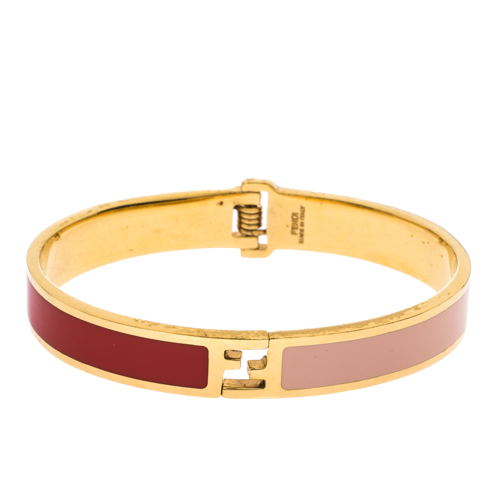 Gold tone with pink enamel womens bracelet