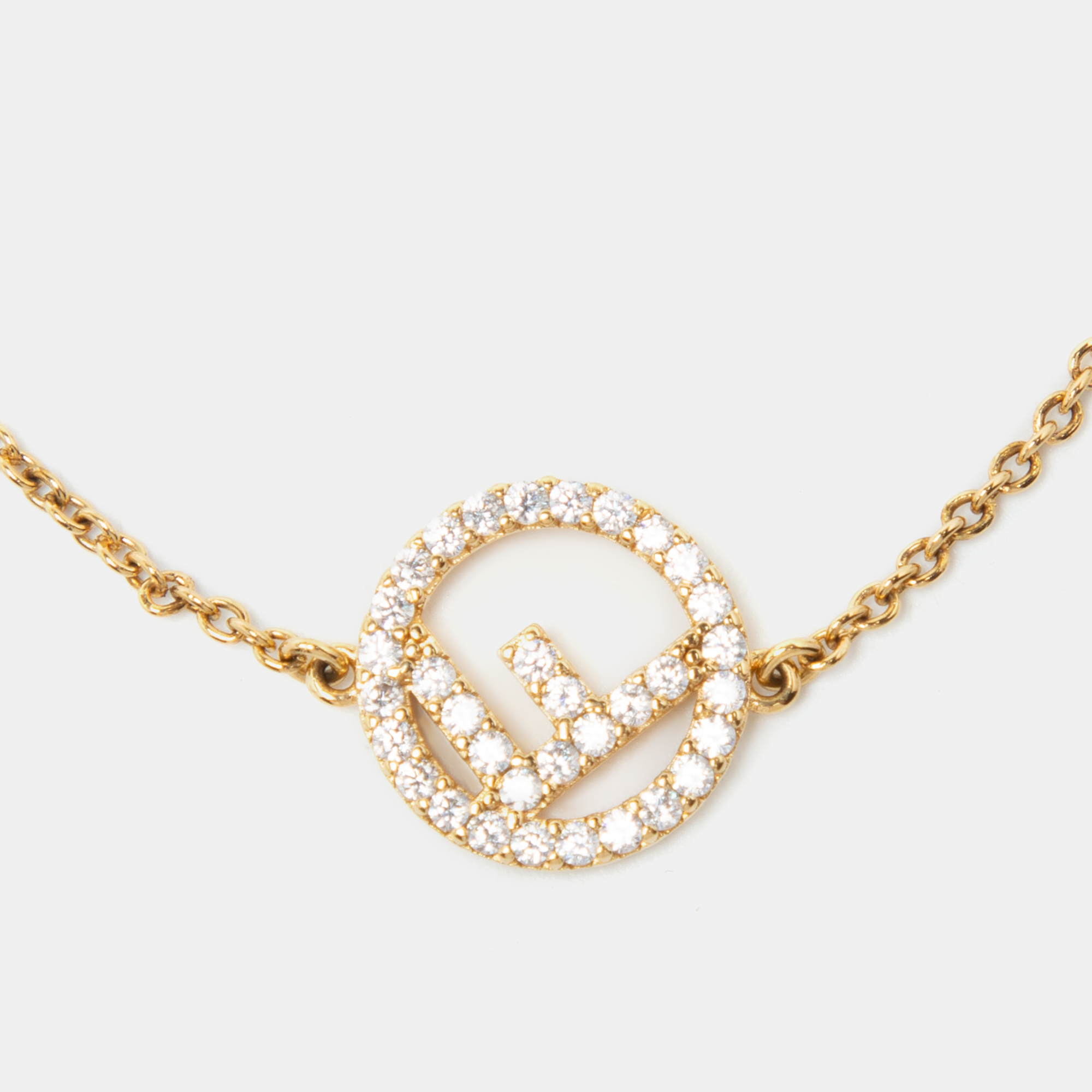 

Fendi F is Fendi Crystal Logo Gold Tone Link Bracelet