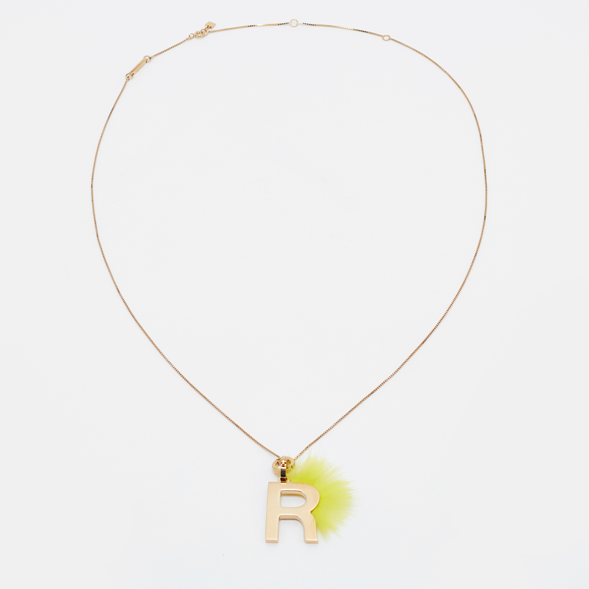 

Fendi Gold Tone Yellow Fur ABClick Letter 'R' Pendant Necklace