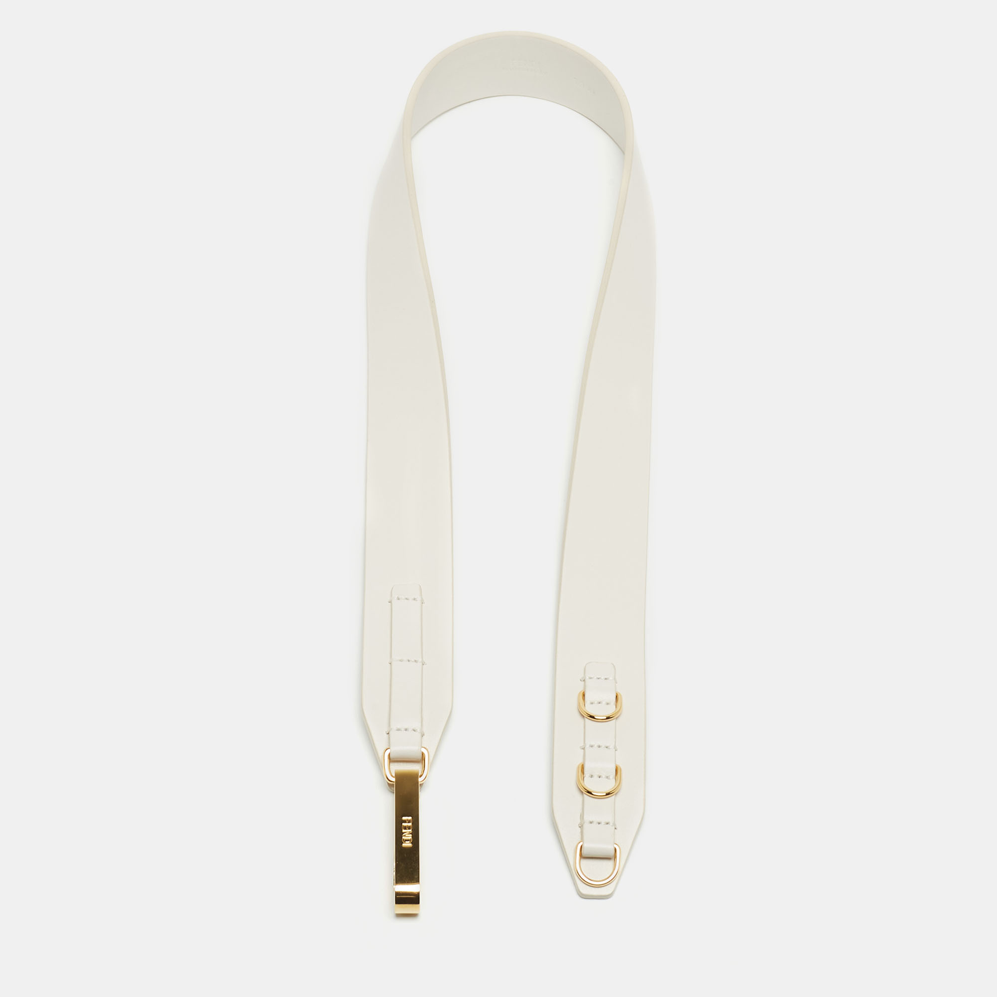 Fendi brings you this super chic shoulder strap that you can flaunt with your collection of handbags. The strap is made from leather and decorated with gold tone clasps.