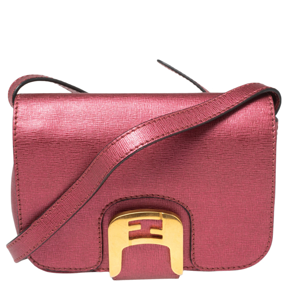 This creation answers why women all over the world love Fendi's fashionable bags. Made from leather it features a front flap that stays secured with a gold tone lock closure. The bag has a long shoulder strap for comfortable carrying and its interior is lined with fabric.