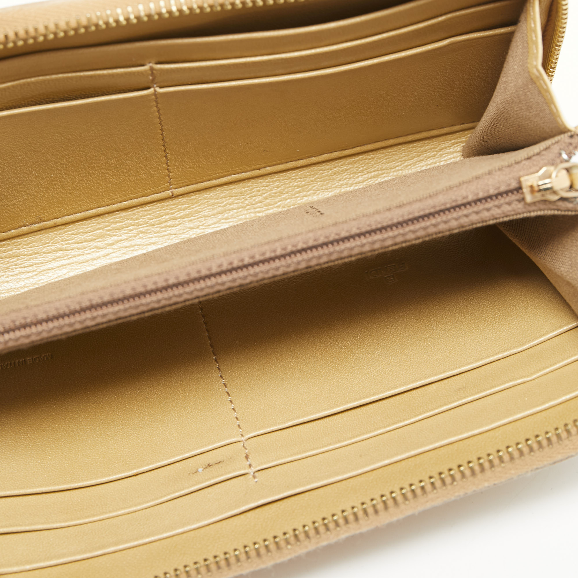 

Fendi Gold Textured Leather Zip Around Continental Wallet