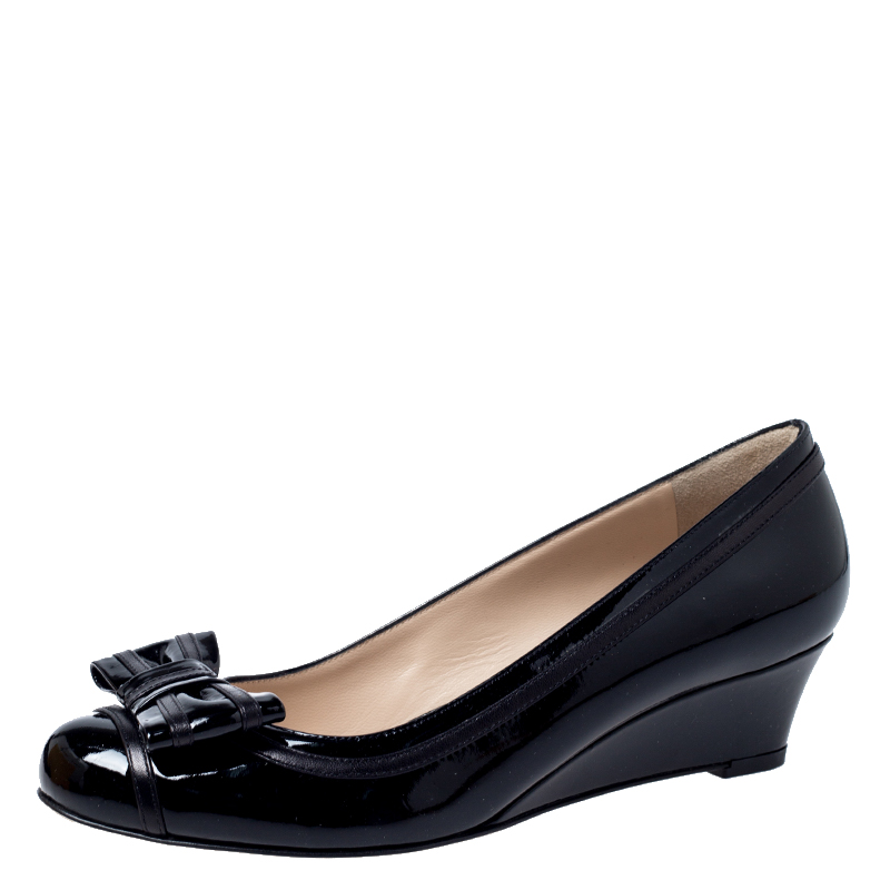 black patent leather wedge pumps