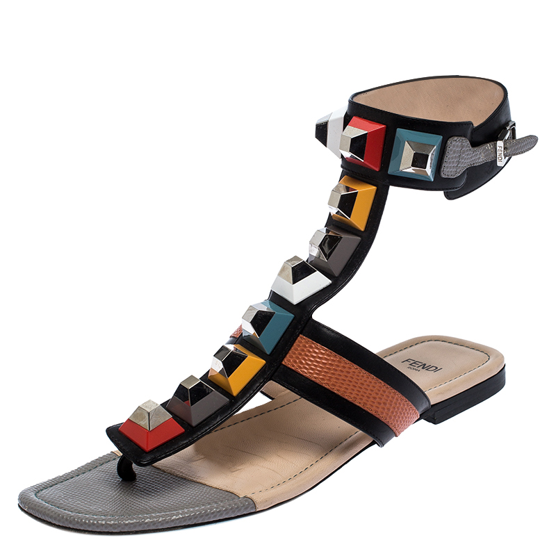 Click to view more detailed imagery on our partner's website Fendi Multicolor Leather And Lizard Embossed Studded Ankle Cuff Flat Sandals Size 37.5