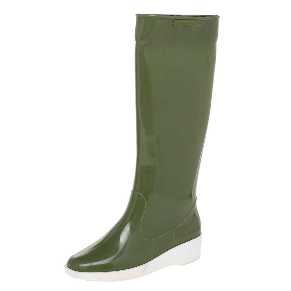 These perfect for monsoons boots from Fendi are crafted from green hued rubber. They come with almond shaped toes logo detailing near the tops rubber heels and padded insoles.