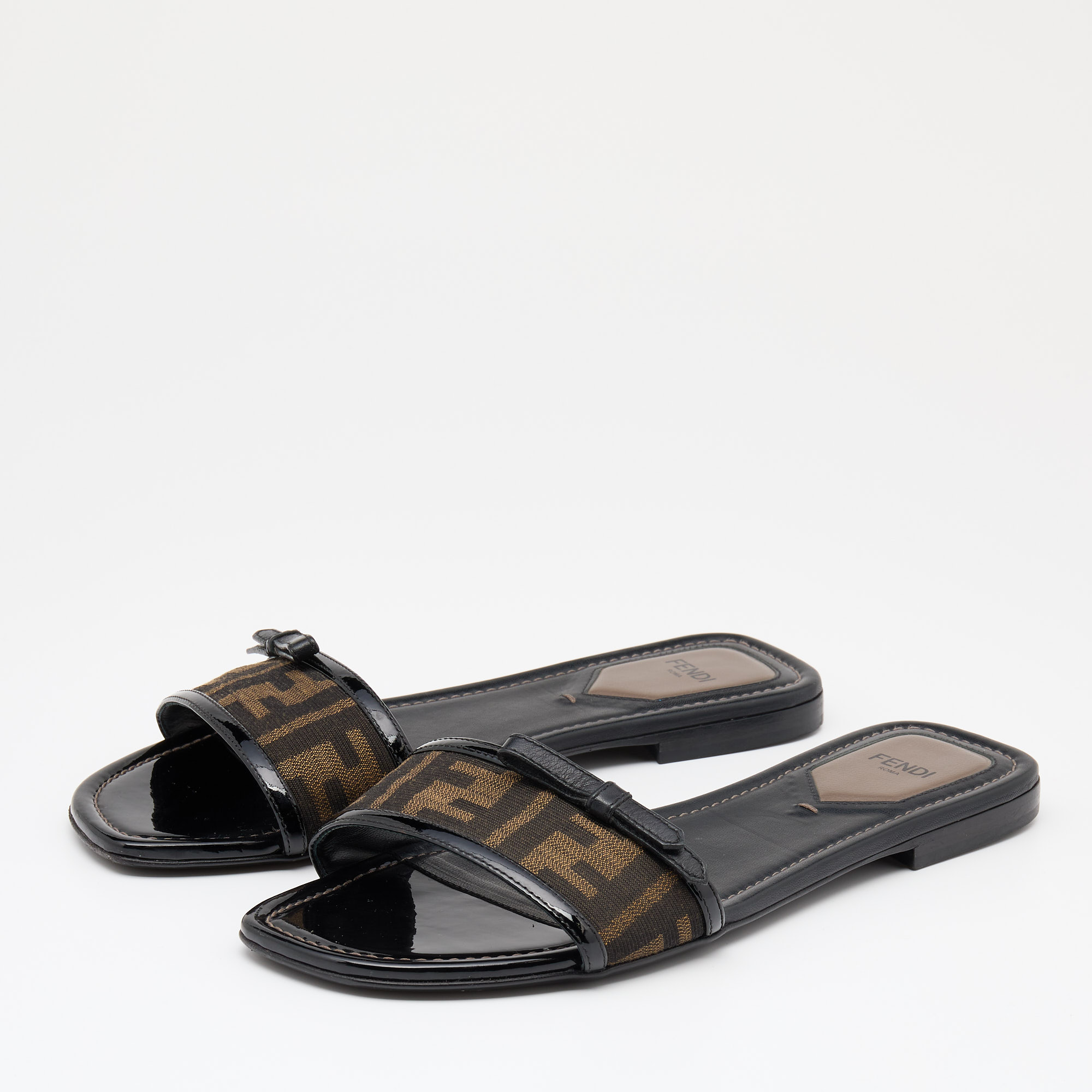 

Fendi Brown/Black Zucca Canvas And Patent Leather Bow Flat Slides Size