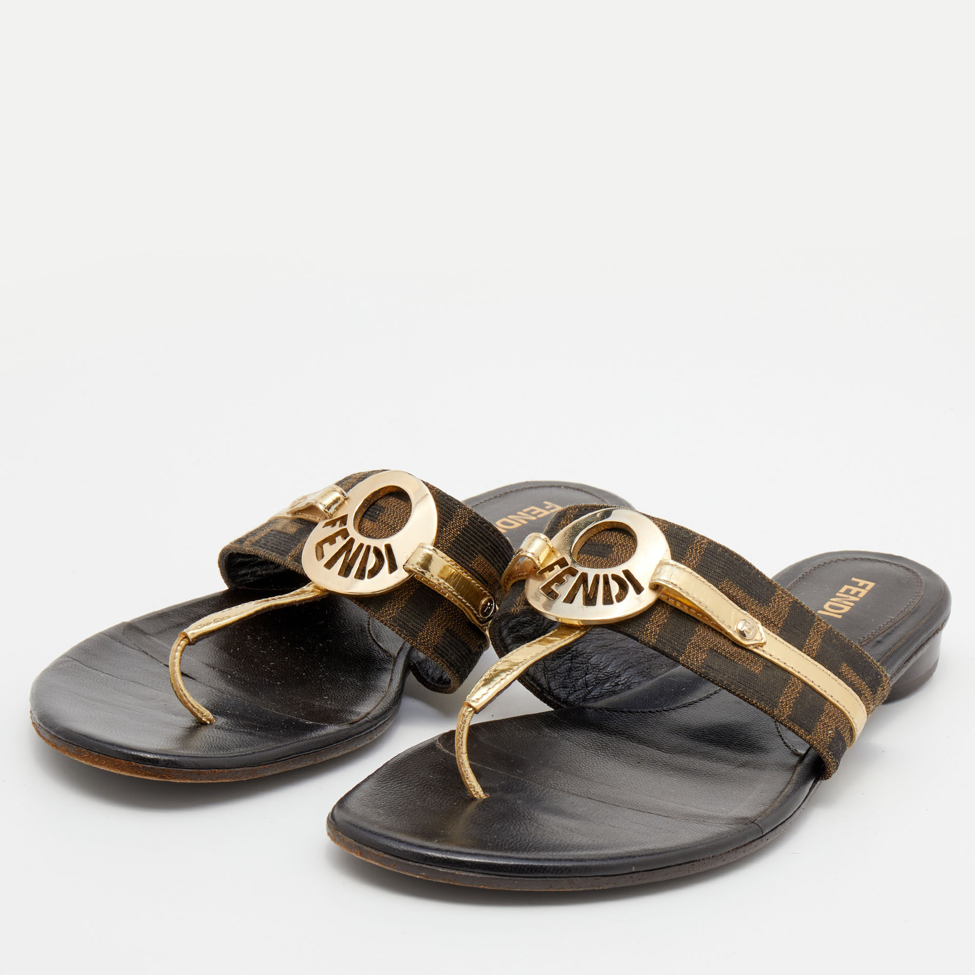 

Fendi Metallic Gold/Brown Leather And Zucca Canvas Flat Thong Sandals Size