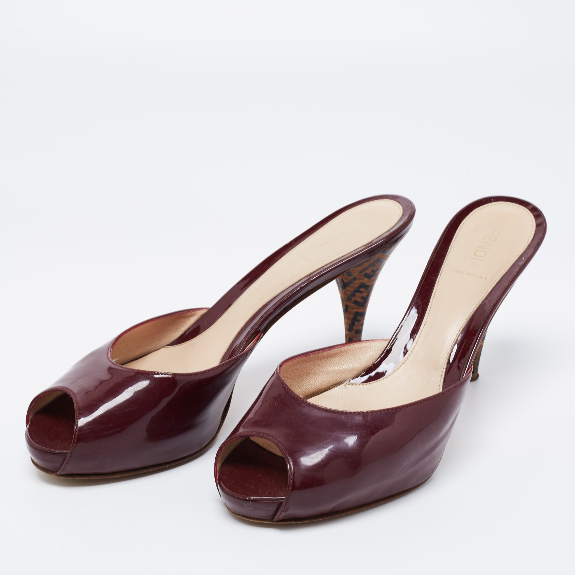 

Fendi Burgundy Patent Leather FF Superstar Peep Toe Mules Size