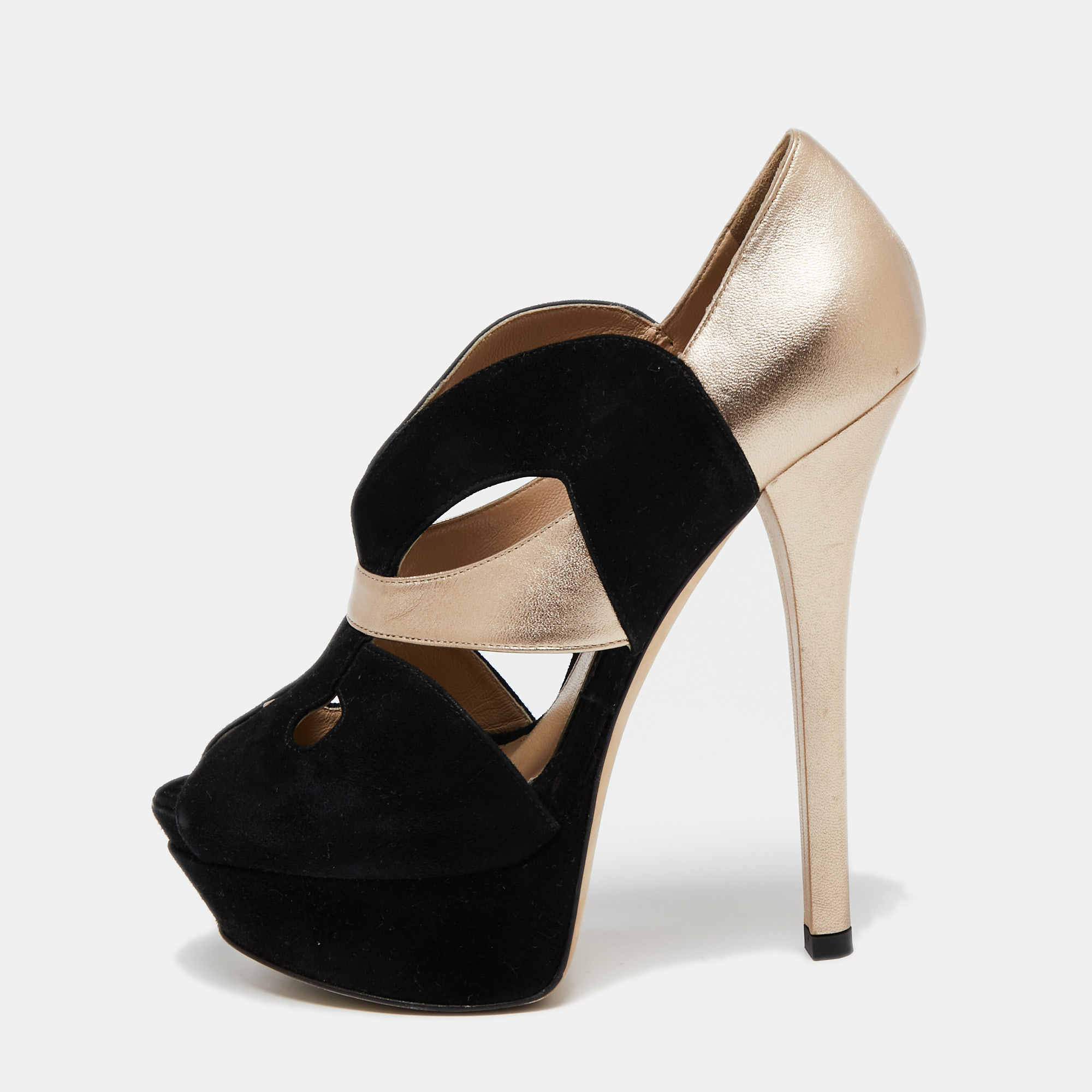 With precise cut out detailing this pair of Fendi pumps is the perfect inspiration for a stylish look. It is created from leather and suede with its 15cm heels mounted on platforms for a smooth walking experience.