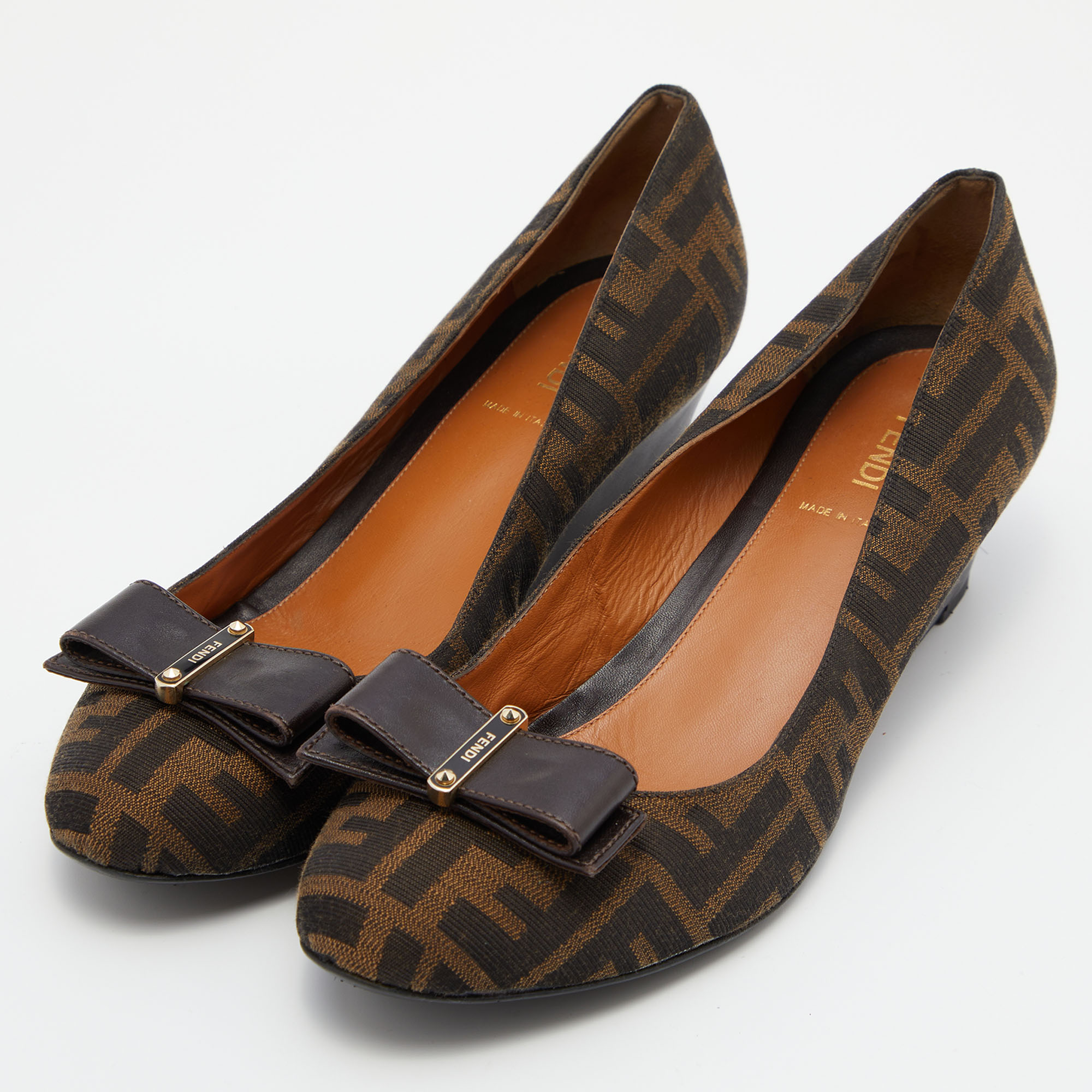 

Fendi Tobacco Zucca Canvas and Leather Bow Round Toe Wedge Pumps Size, Brown