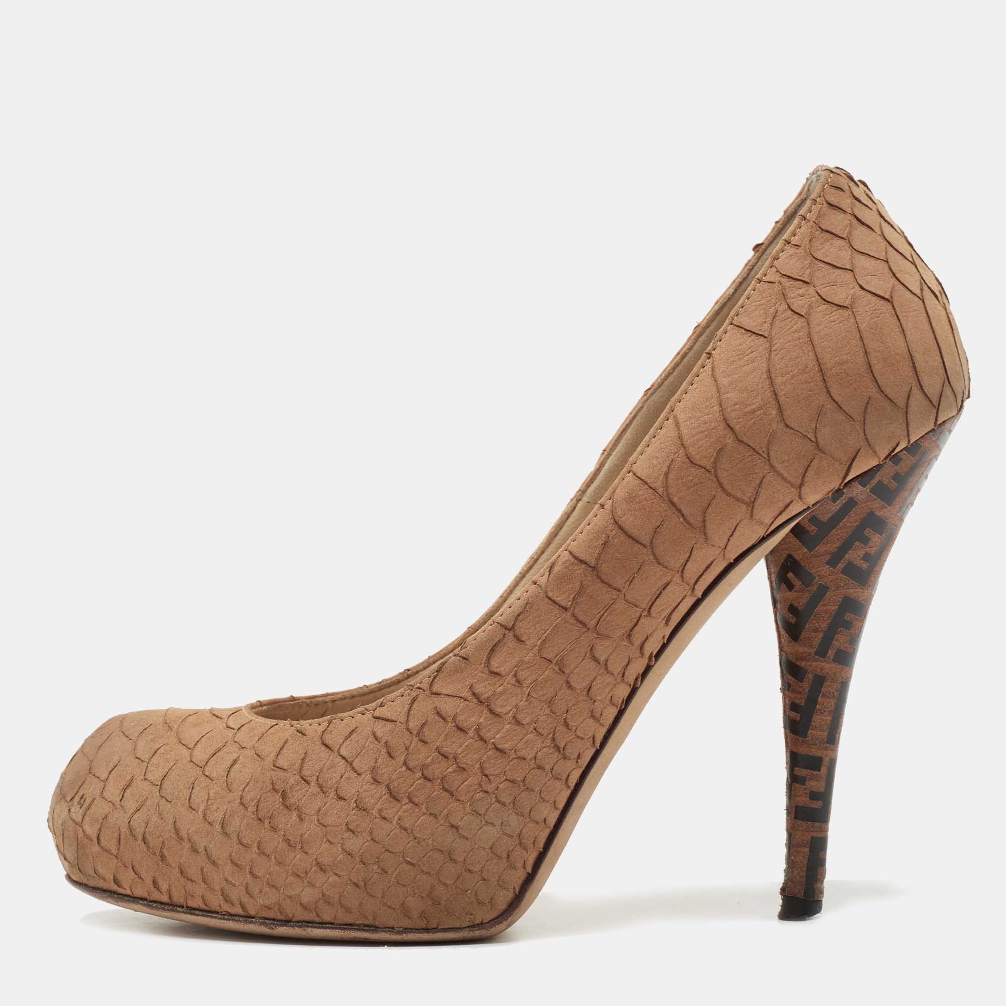 Made by Fendi this pair of pumps is the perfect mix of comfort and style. Amp up your style quotient by wearing this pair of patent python embossed pumps. This pair of brown pumps is complete with signature FF logo detailed stiletto heels.