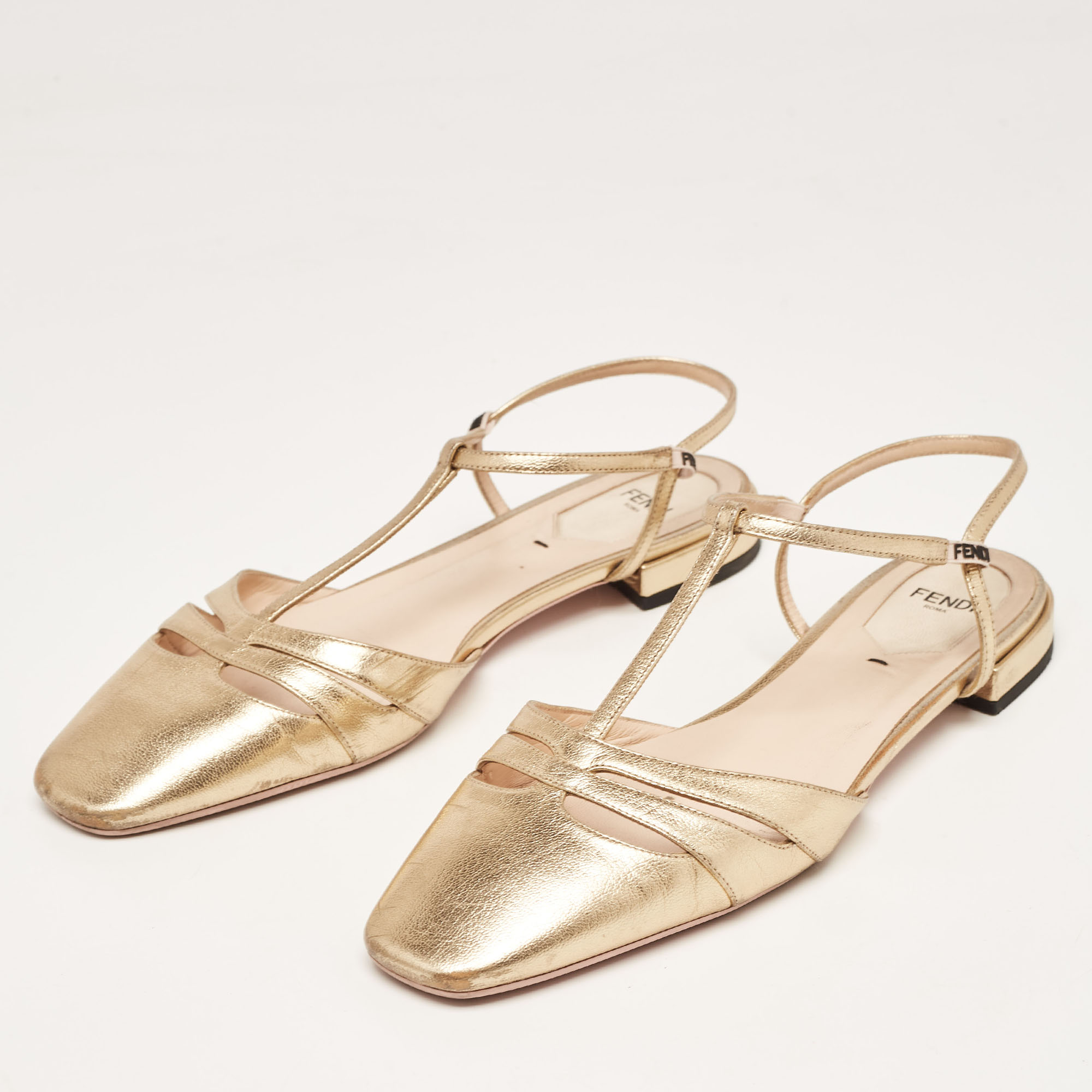 

Fendi Gold Leather T-Strap Flat Sandals Size
