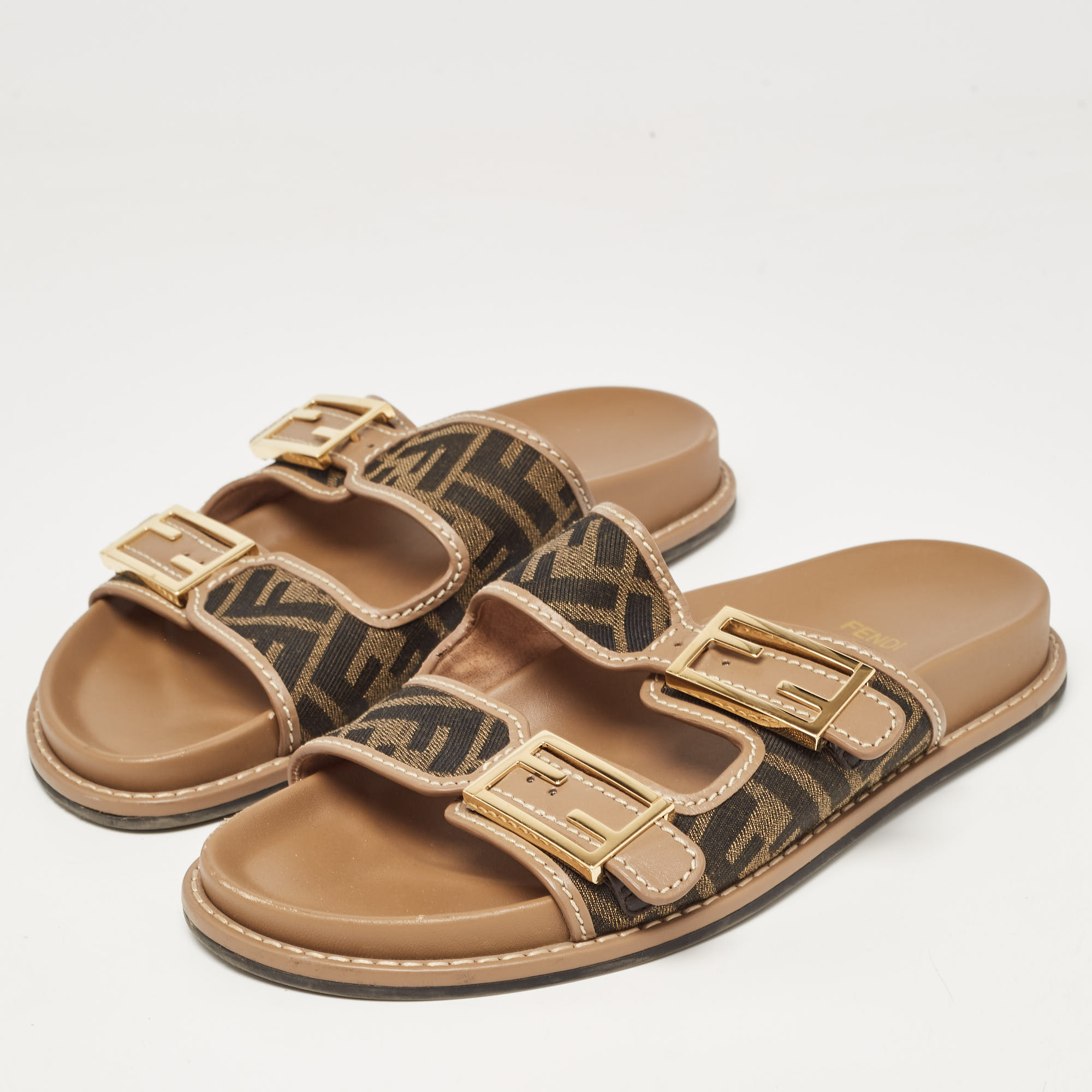 

Fendi Brown Zucca Canvas and Leather Strap Flat Slides Size, Multicolor