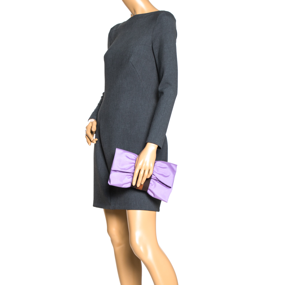 

Furla Lavander/Brown Canvas and Leather Bow Clutch, Purple