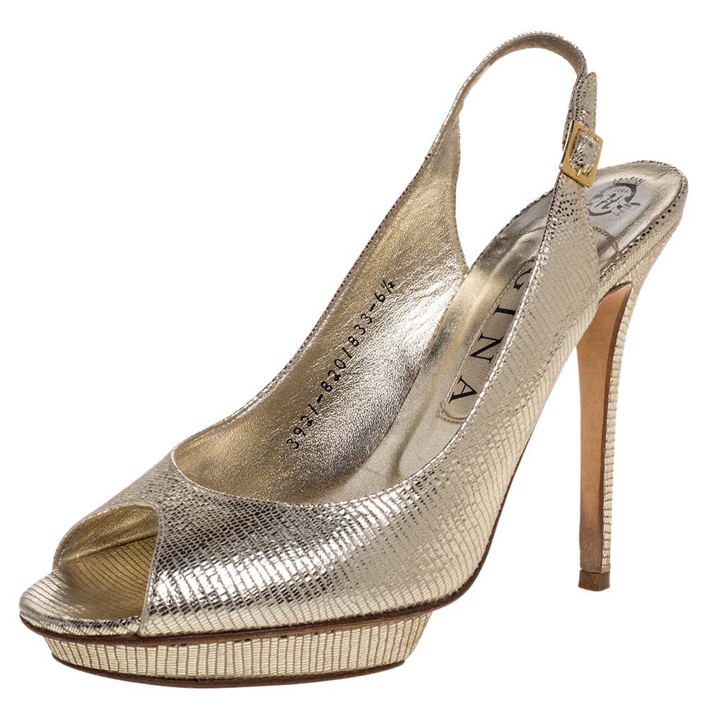 These lovely Gina sandals are ideal with formals as well as casuals. Crafted from gold lizard embossed leather they are styled with peep toes 12.5 cm heels and slingbacks. They are finished with leather lined insoles and platforms for maximum comfort.