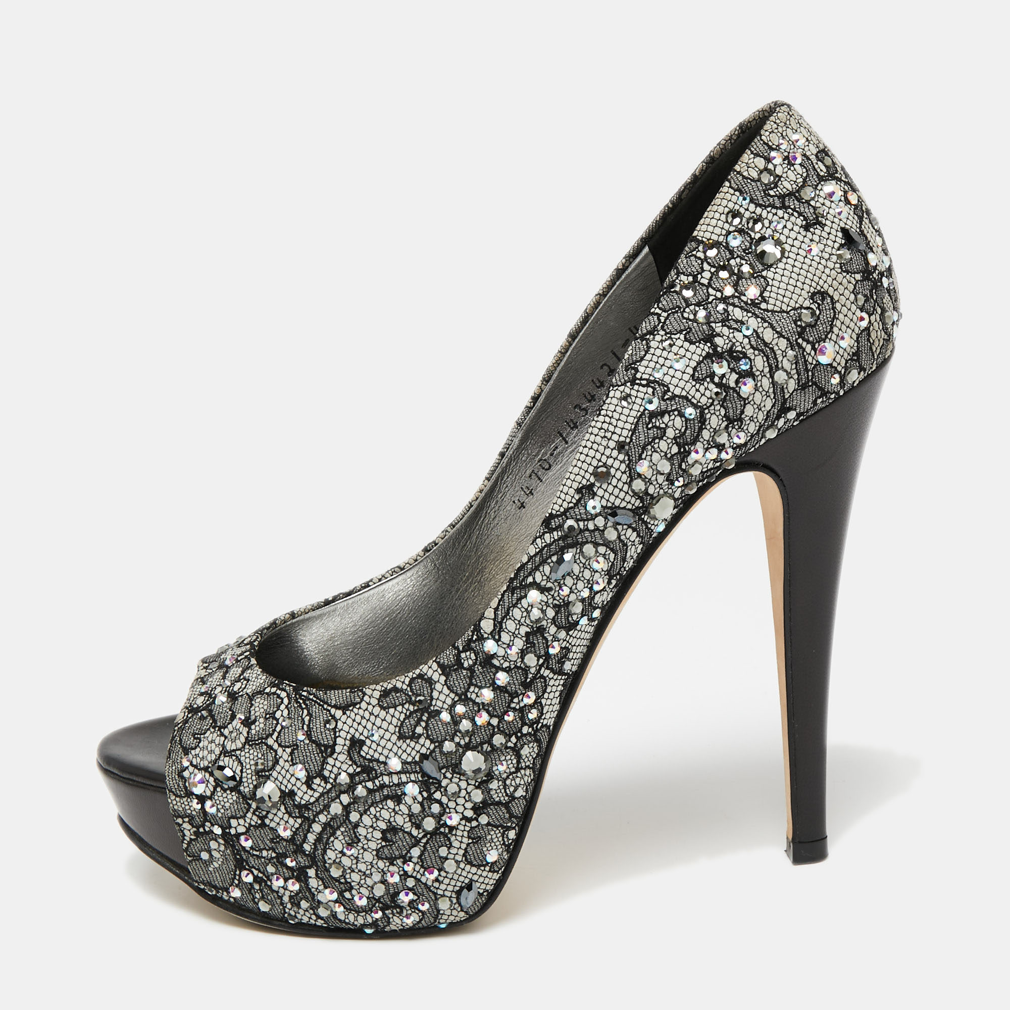 Take every step with elegance and style in these pumps from the House of Gina. They are crafted meticulously using grey black lace which is highlighted with crystal embellishments. They showcase platforms peep toes and tall heels. These pumps will be your favorite pair in no time