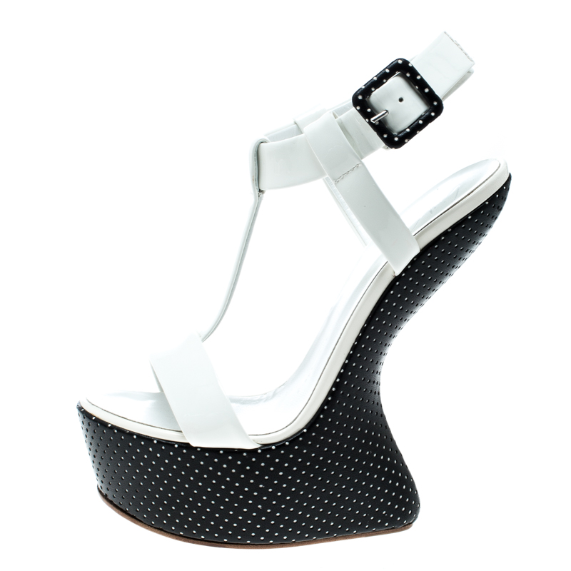 

Giuseppe Zanotti White Patent Leather Heel Less T-Strap Wedge Sandals Size