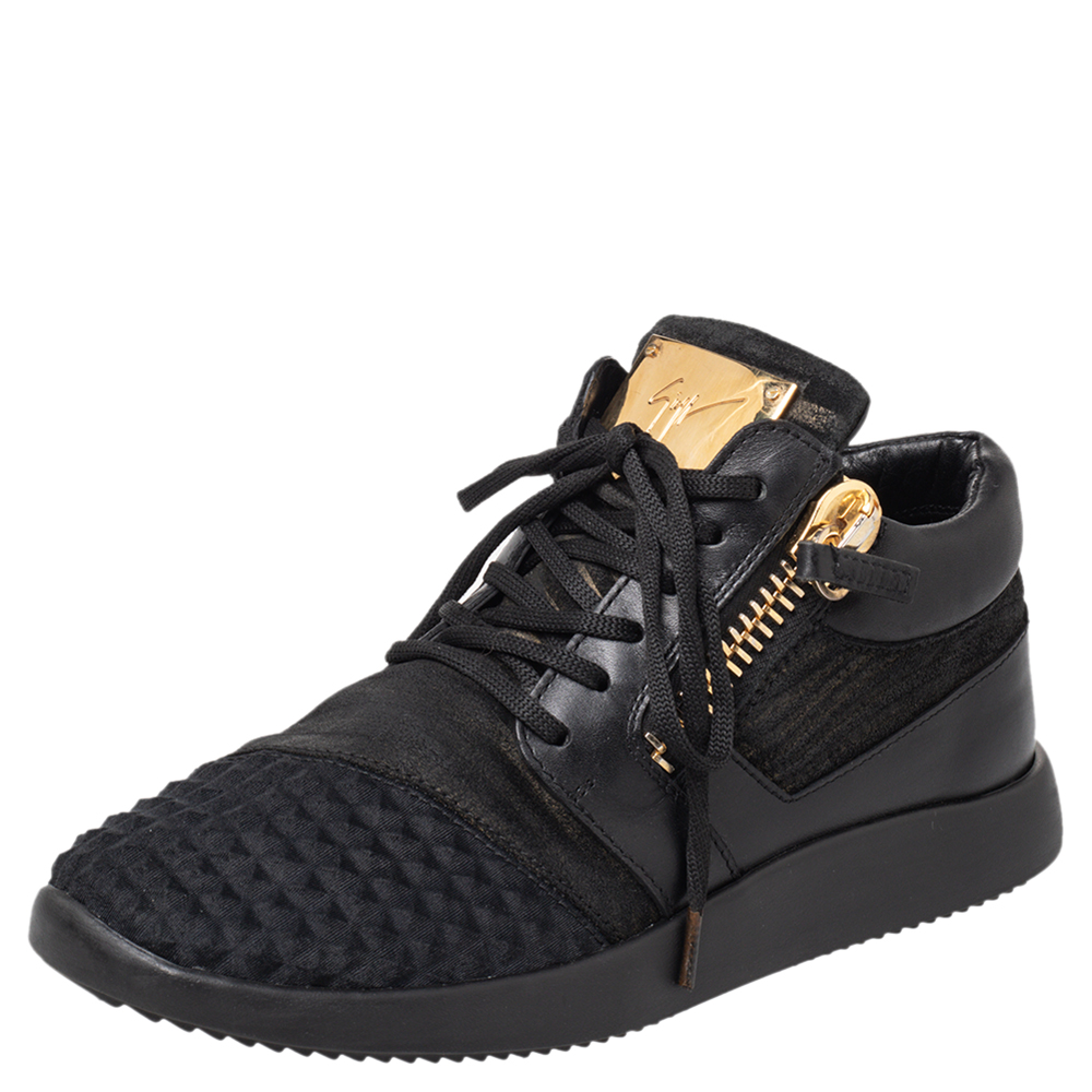 A statement in style and comfort these shoes from Giuseppe Zanotti come in a leather and suede body. They are enhanced with a black hue lace up front logo detail at the tongue and zip accents at the quarters. The pair also features interior lining cushioned insole and sturdy soles.