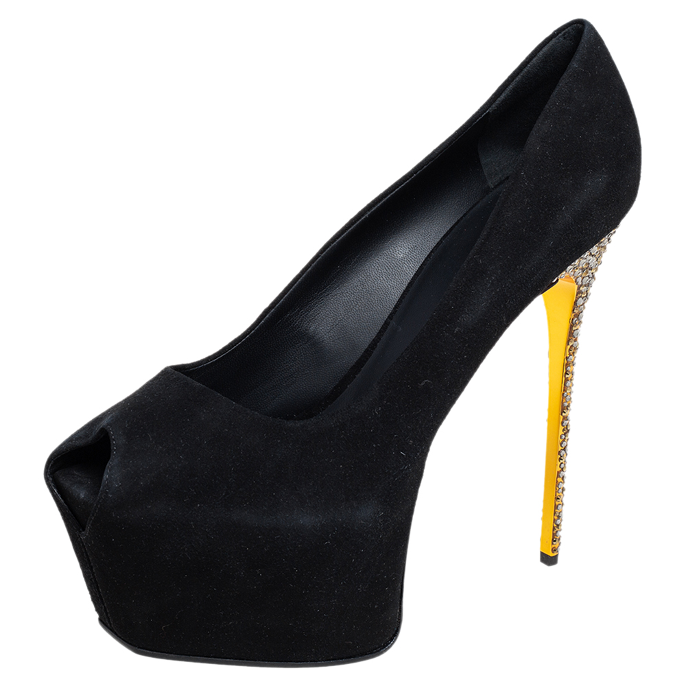You can never go wrong with these stylish Giuseppe Zanotti pumps. Crafted in Italy they are made from black suede. They are styled with peep toes 15 cm high heels embellished with crystals and supported by platforms and a sculpted top line. They are finished with leather lining insoles and soles.