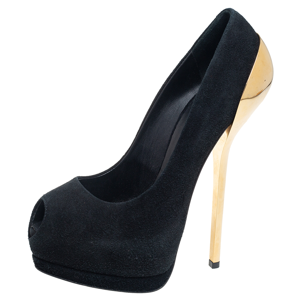 This galvanizing pair of pumps characterized by its sophistication and curves are offered by Giuseppe Zanotti. The exterior is crafted with black suede and they come with peep toes platforms and leather lined insoles. These lovely pumps are complete with towering gold tone 17 cm heels.