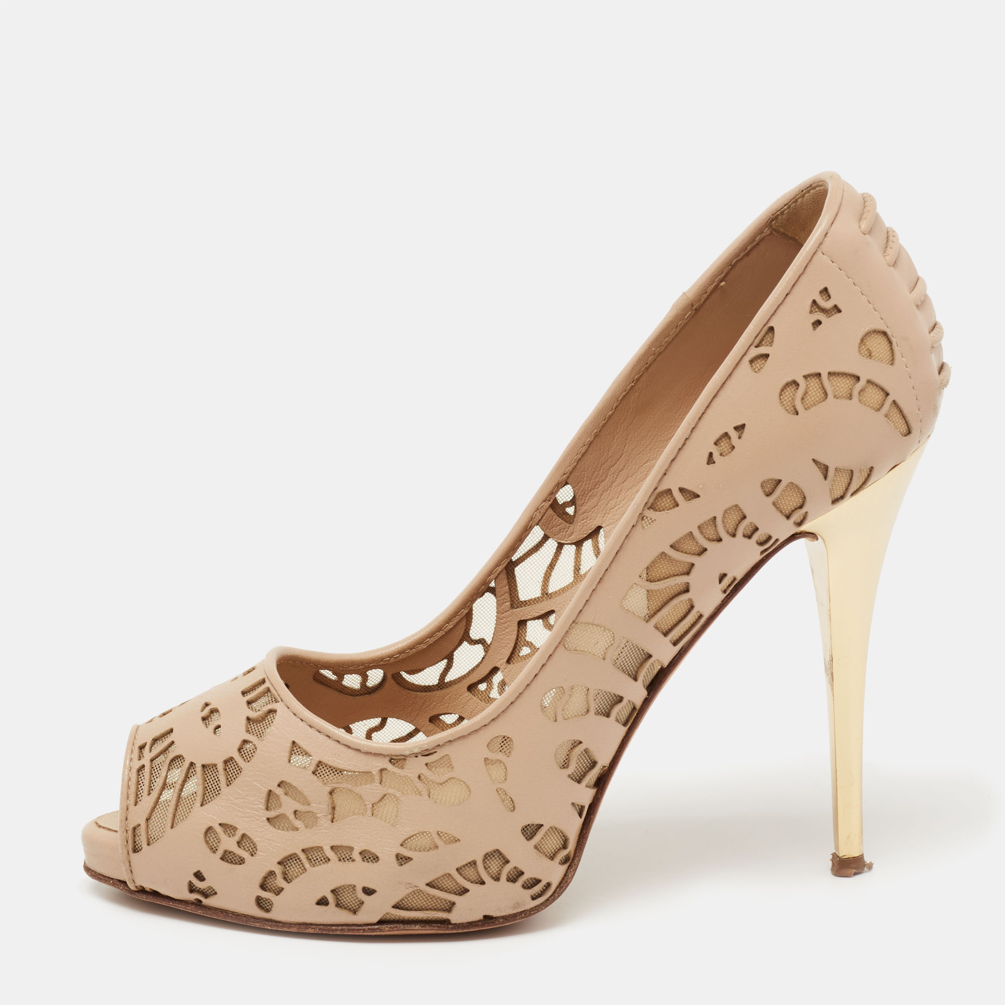 This pair of pumps from Giuseppe Zanotti is a combination of sophistication and comfort. The Sharon shoes have been exquisitely crafted from leather and net and feature intricate detailing peep toe silhouette and gold tone hardware. Lifted on 10cm heels it can elevate any outfit.
