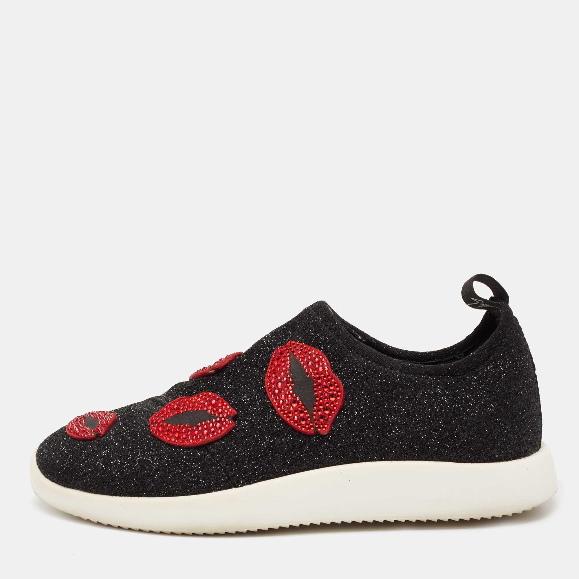 Beautifully crafted using lurex fabric these Giuseppe Zanotti slip on sneakers are sure to keep you comfortably stylish. Featuring embellished kiss motifs pull tabs and flexible rubber soles these shoes will be a great addition to your closet.