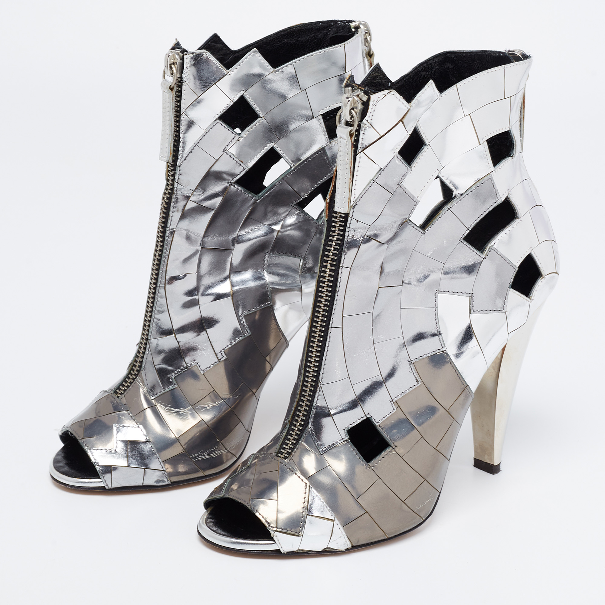 

Giuseppe Zanotti Silver Leather Cutout Ankle Boots Size