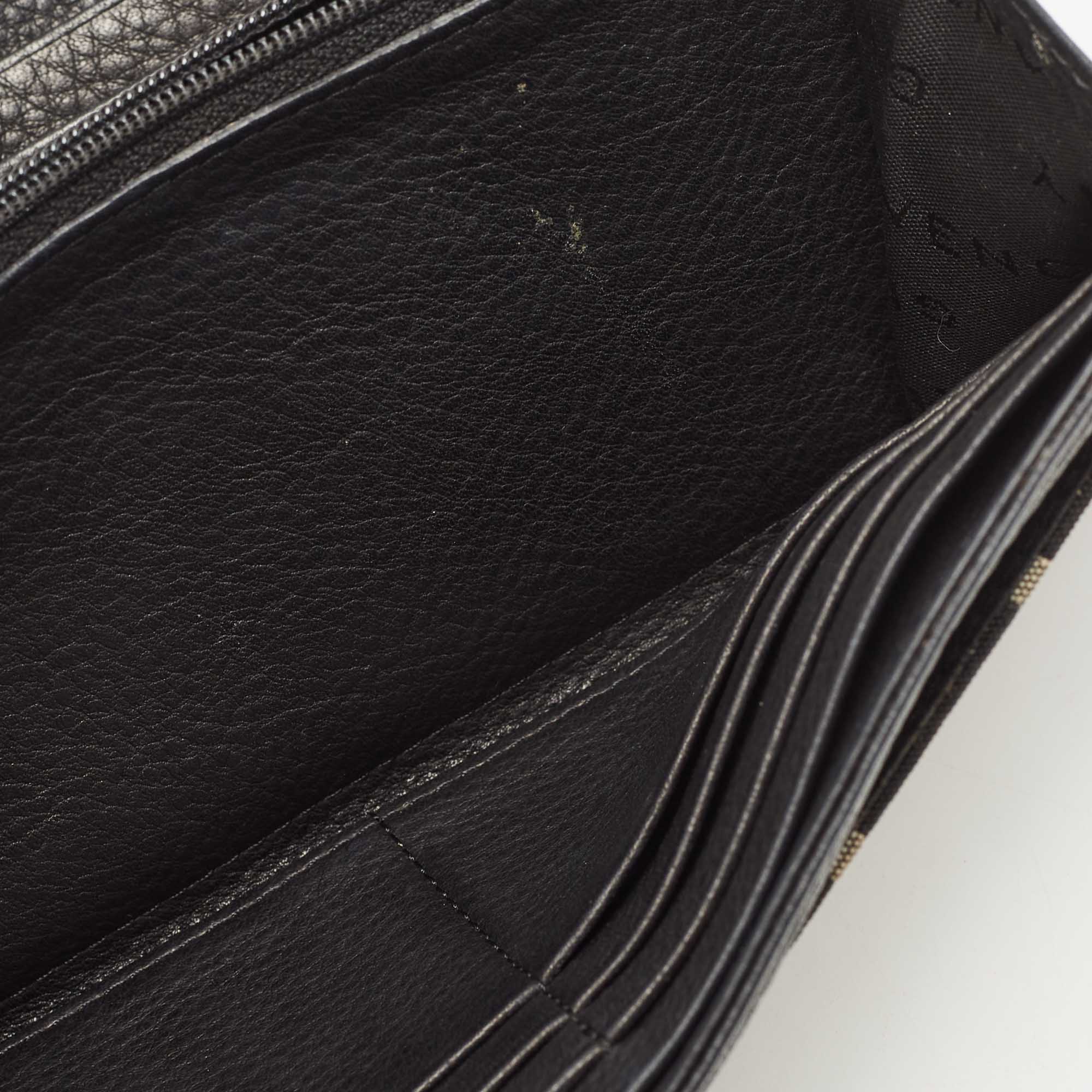 

Givenchy Black Monogram Canvas and Leather Flap Continental Wallet