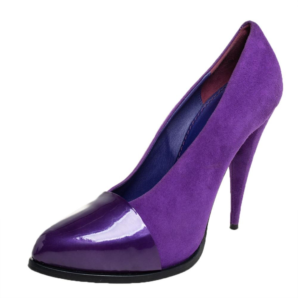 A fine reflection of contemporary style these pumps from Givenchy are made of suede and patent leather The pair is defined by a purple hue. Elevated by 12 cm stiletto heels these pumps can be styled with varied shades of formal as well as casual attire.