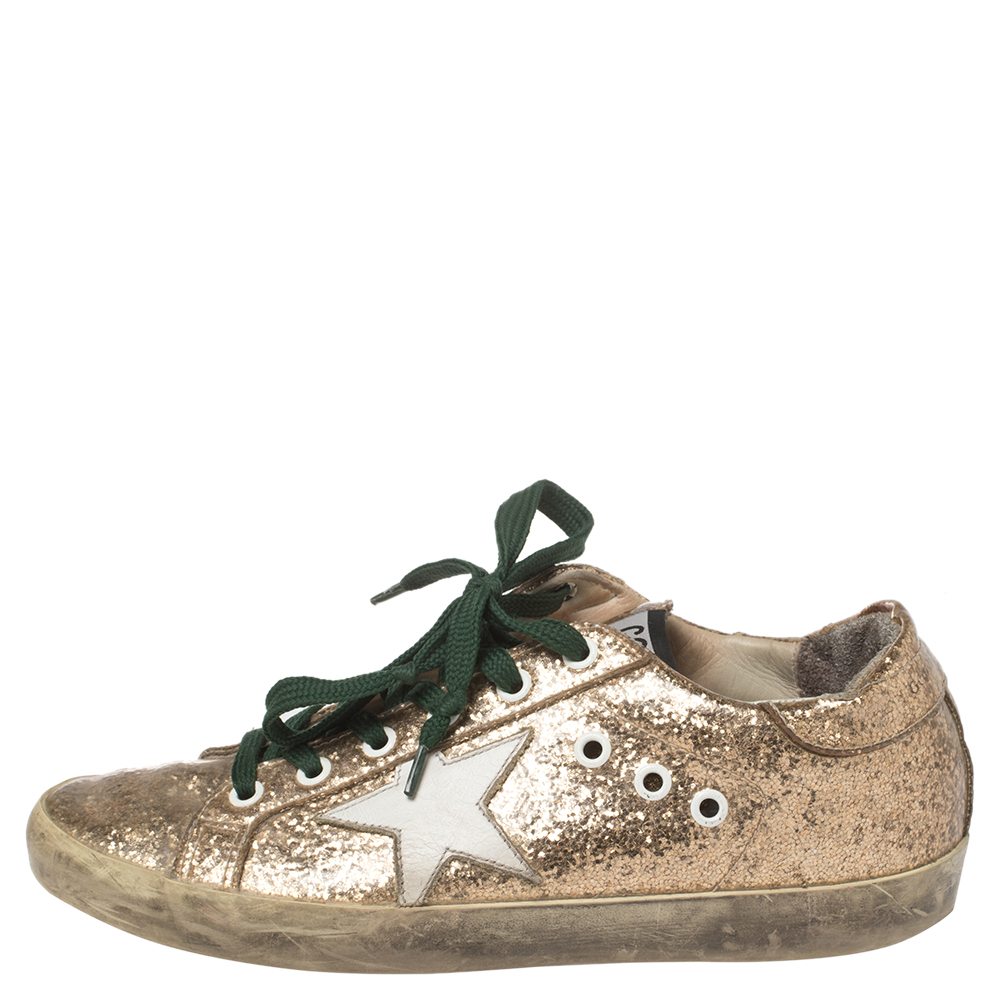 

Golden Goose Gold Glitter And PVC Superstar Sneakers Size