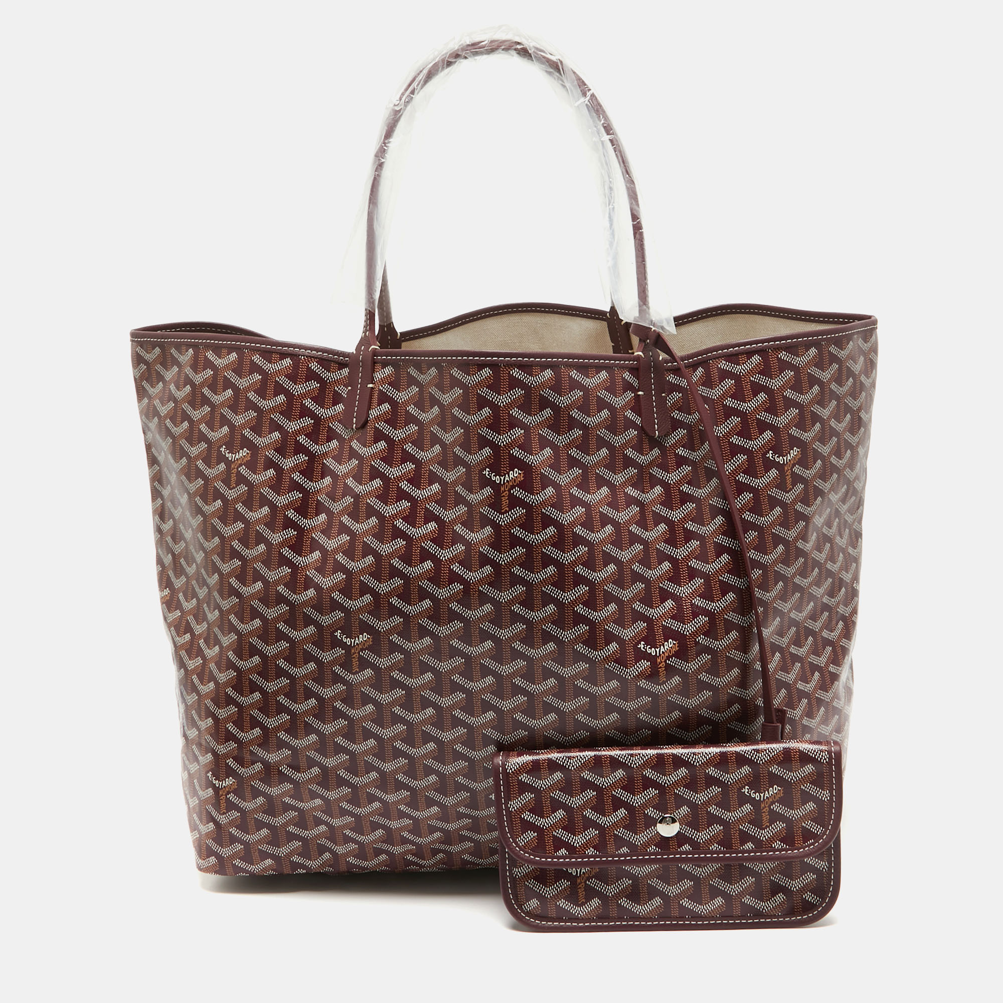 With the signature Goyardine print all over the St Louis GM tote from Goyard is crafted with canvas and features dual sleek handles. A timeless addition to your collection this bag is a must have