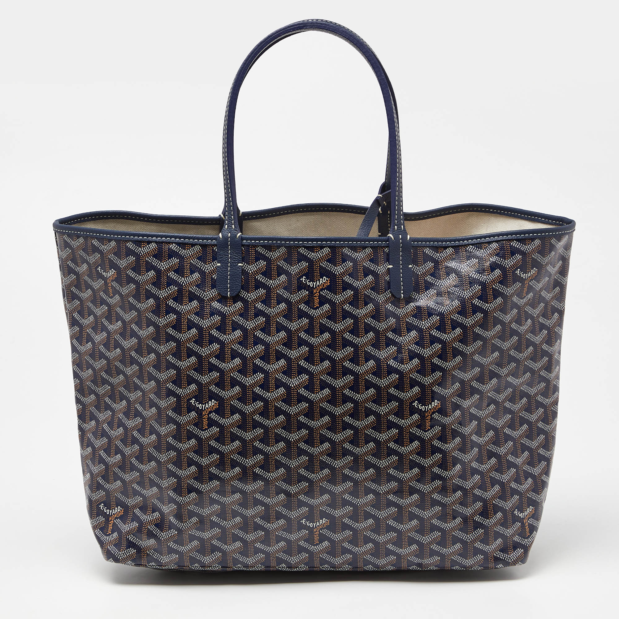 Handbags are more than just instruments to carry ones essentials. They express a womans sense of style and the better the bag the more confidence she gets when she holds it. Goyard brings you one such bag meticulously made from Goyardine canvas and leather trims. The Saint Louis PM tote has a spacious fabric interior two handles and a small pouch.